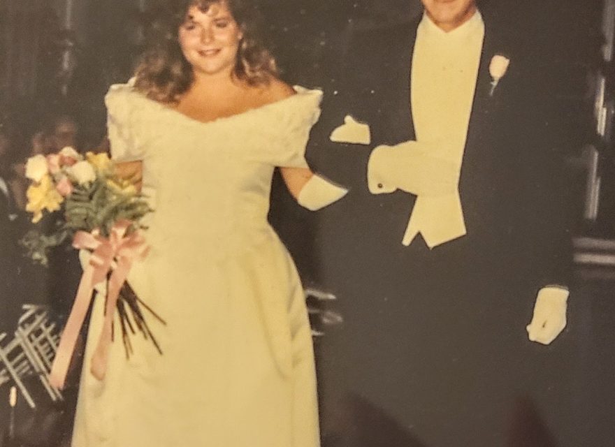 Ellis and her father walking out of the Ball of Roses